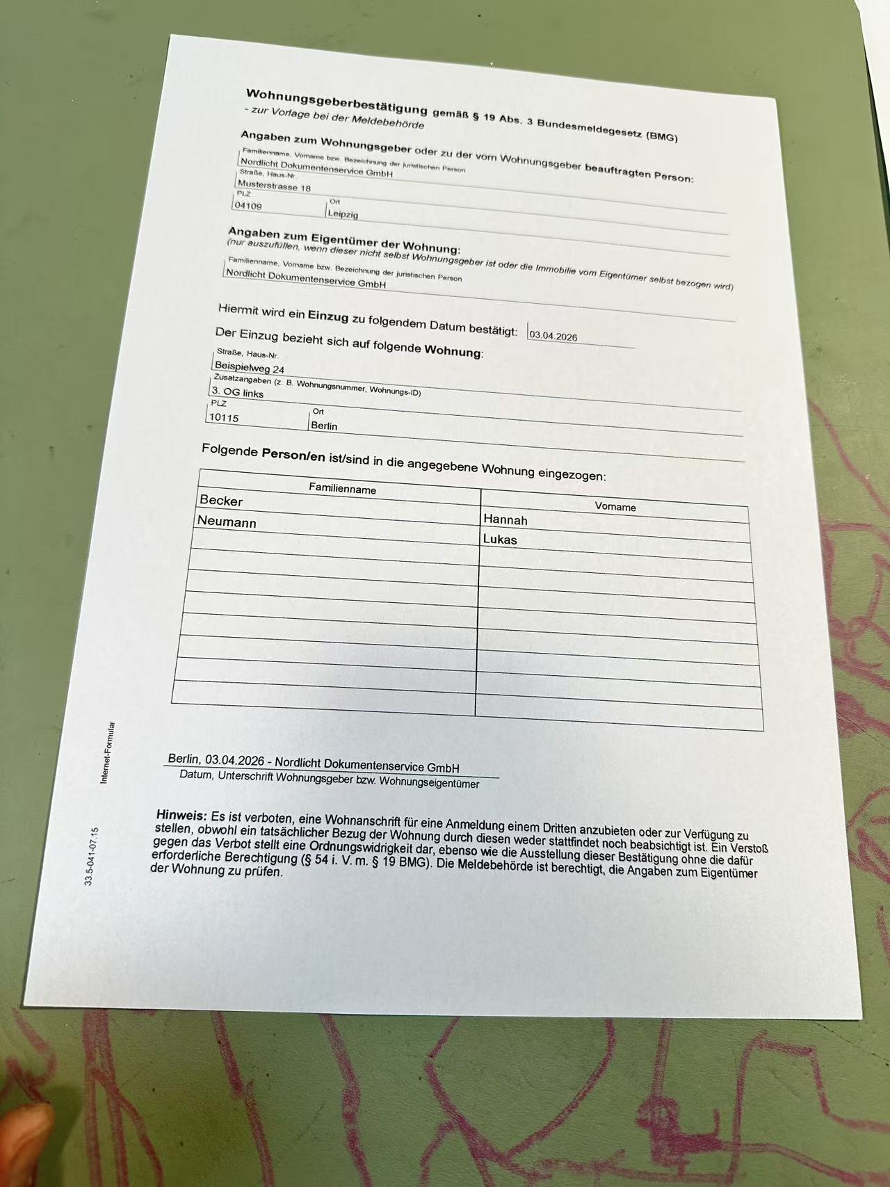 Original photo of an address registration form on a desk